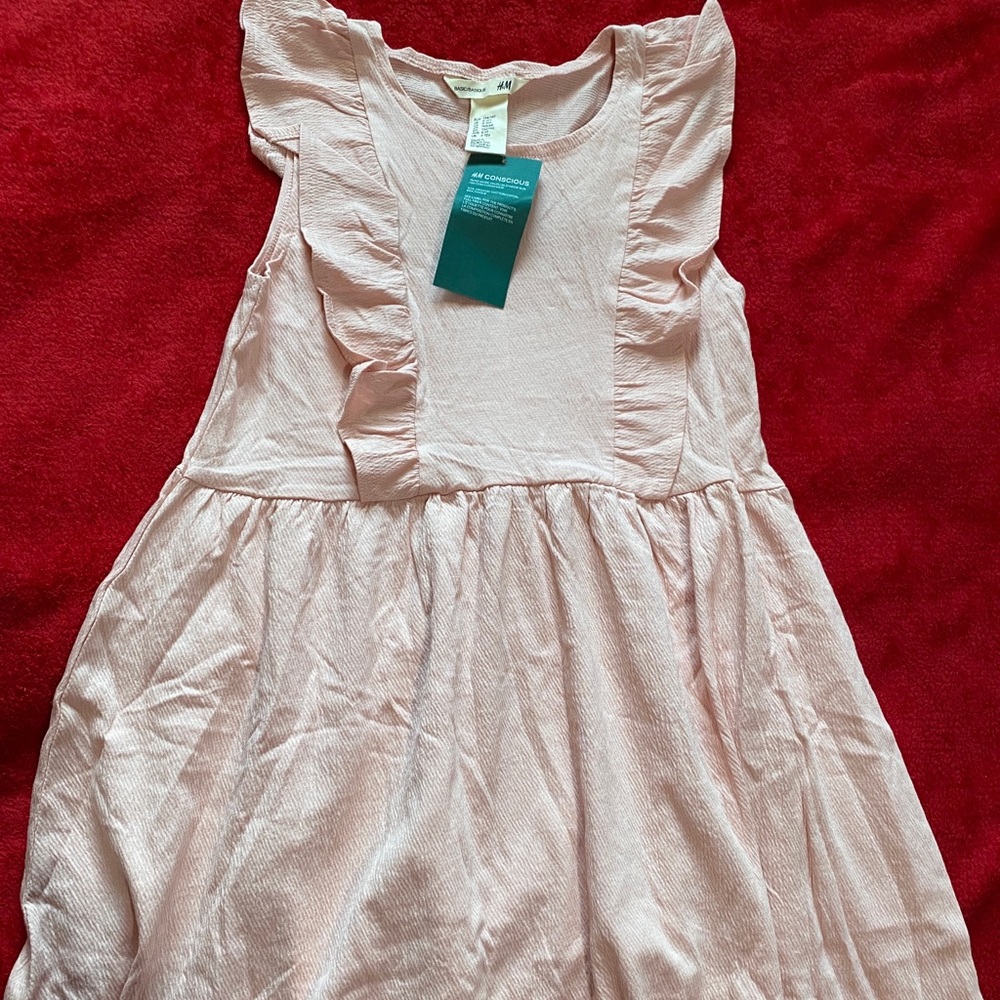 Size: 8-10 girls, color: a light dusty pink, has a vintage look to it